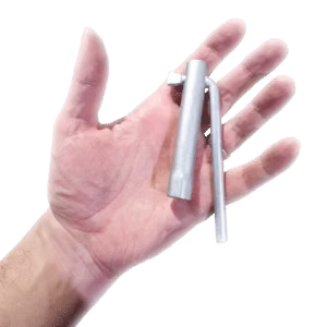 A metal tube spanner rests across an open hand.