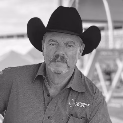 Doug Shaffer wears a shirt embroidered with the Advantage Feeders logo.