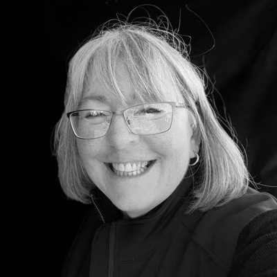 Black-and-white portrait of Shelley Lockhart smiling.